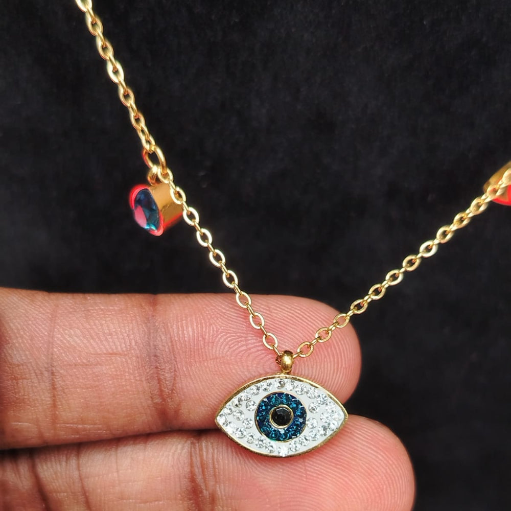 Evil Eye Pendant Necklace in gold accents held in fingers