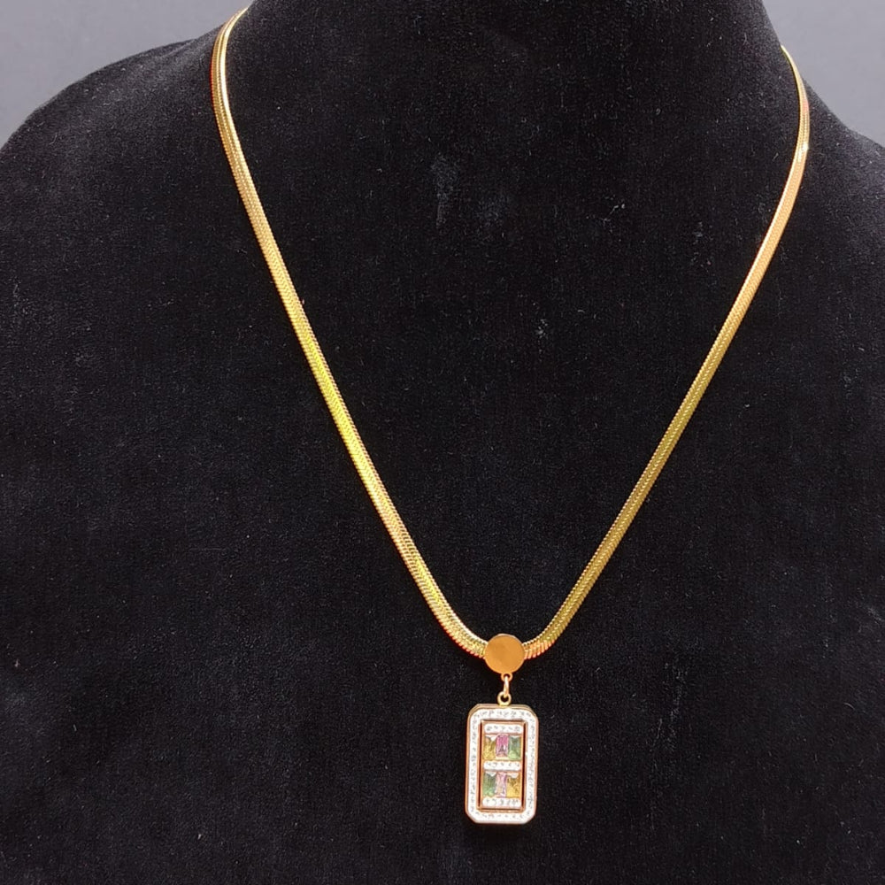 Gold necklace with a pendant on a black velvet stand