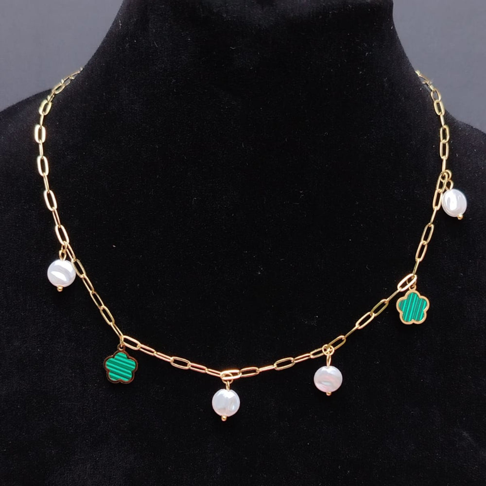 Golden Chain Necklace with Pearl and Clover Charms on a Black Dummy