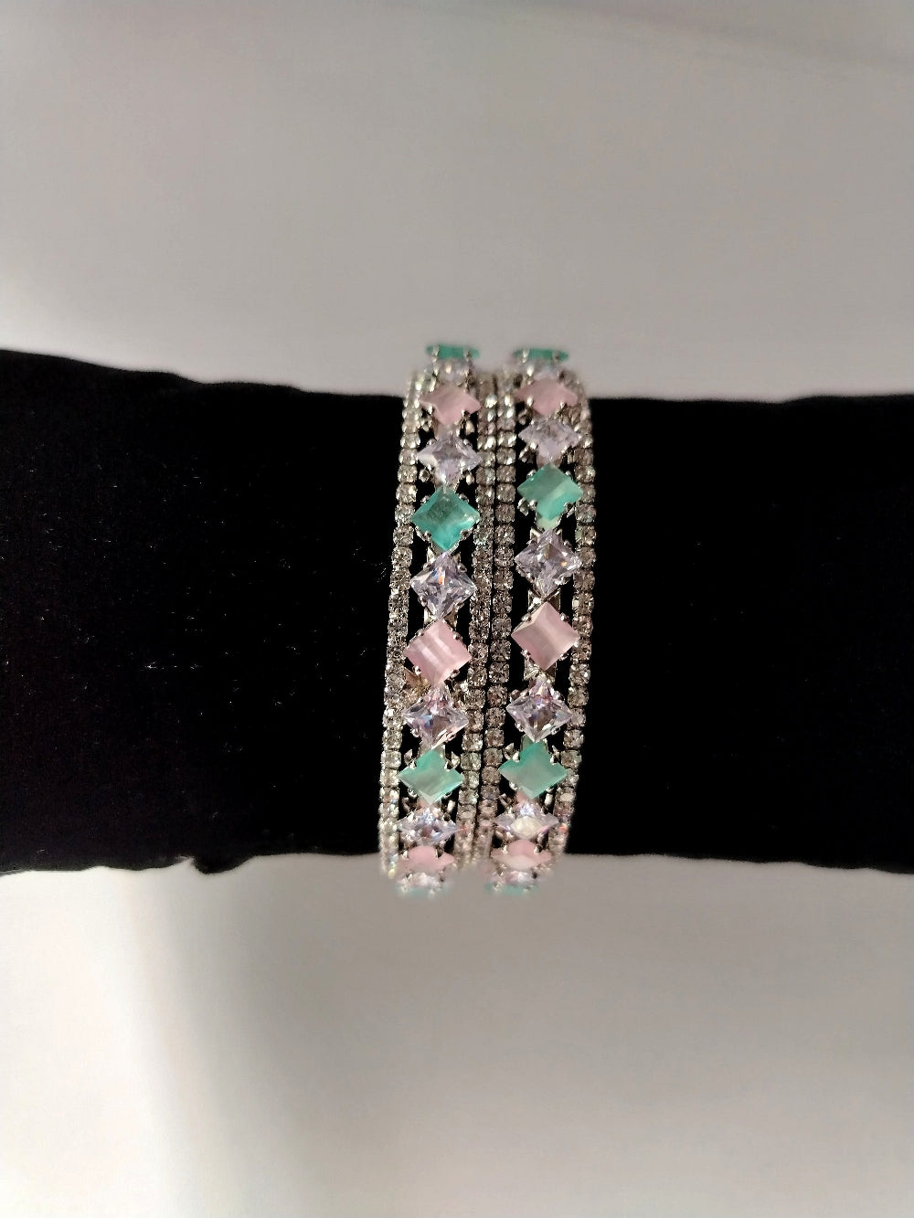 Pink Mint Moissonite and AD bangles on Black Cushion