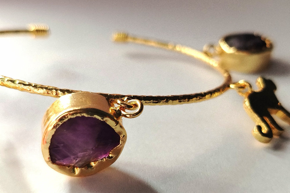 Amethyst Charms of Handcuff Glowing in Sunlight