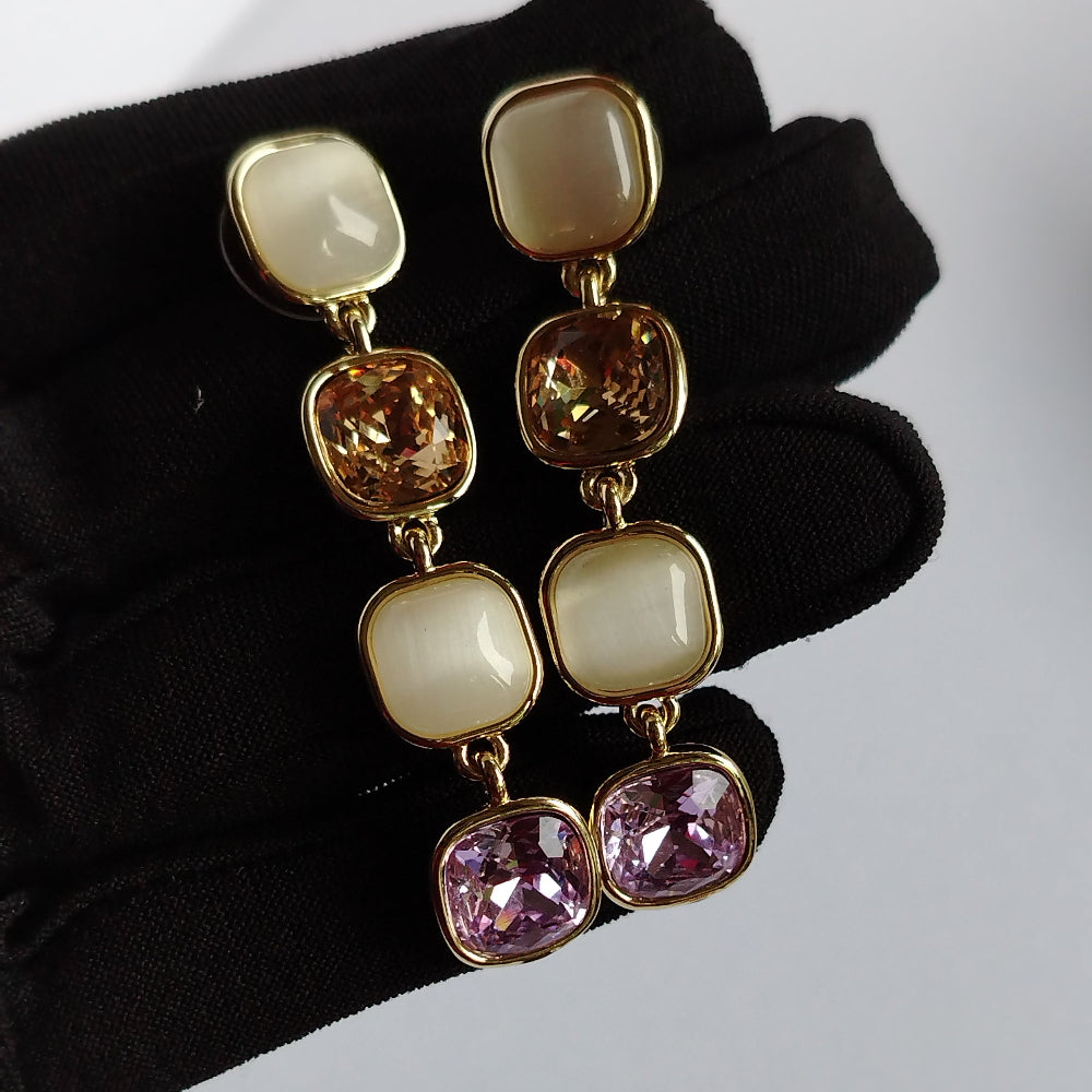 Hands Holding Long Monalisa Earrings