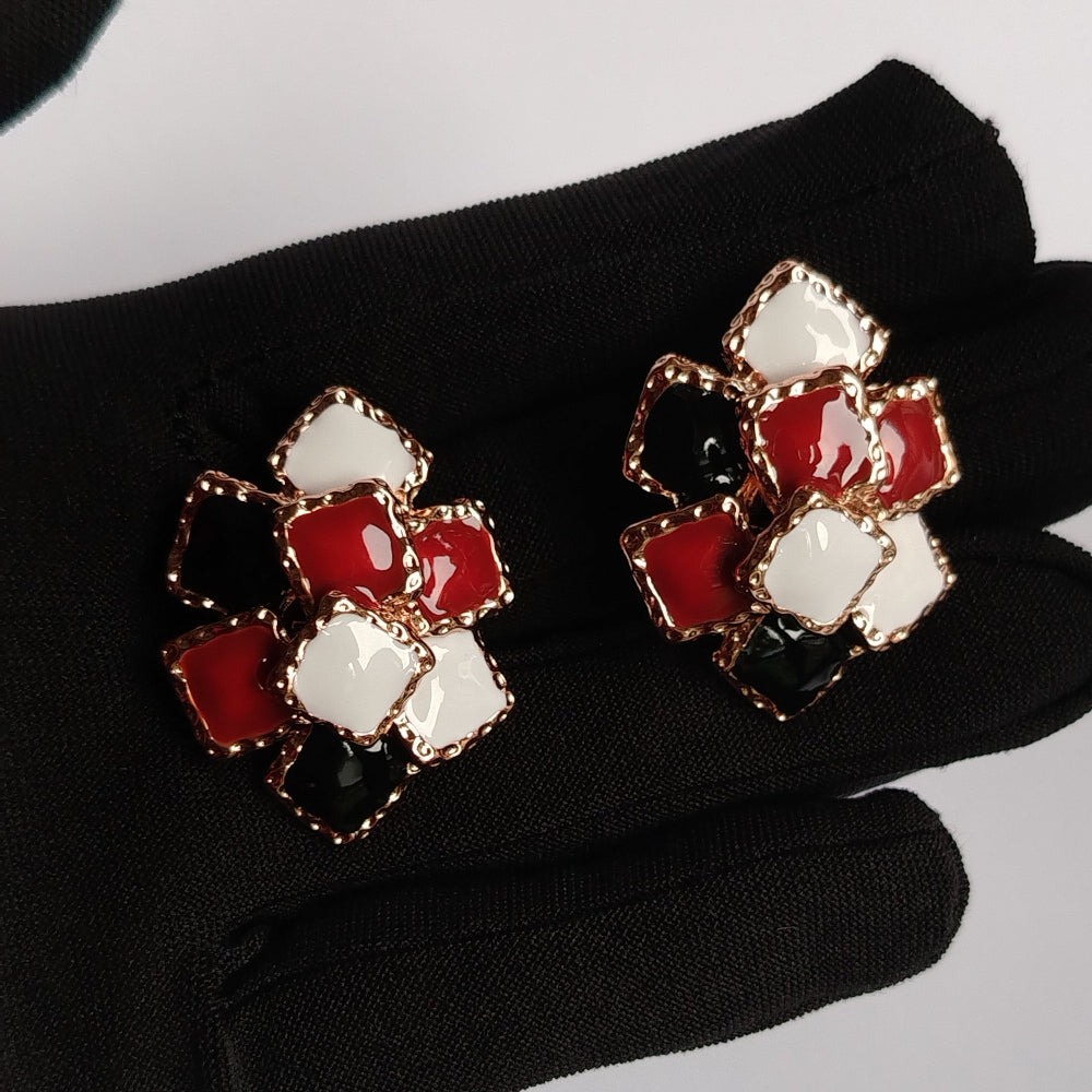 Hands Holding Stacked Square Motif Earrings with Black, White and Red Italian Enamel