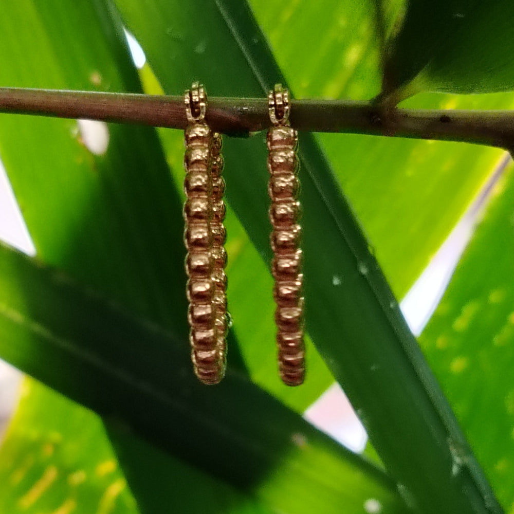 Golden Beaded Style Hoops on a Bamboo Branch