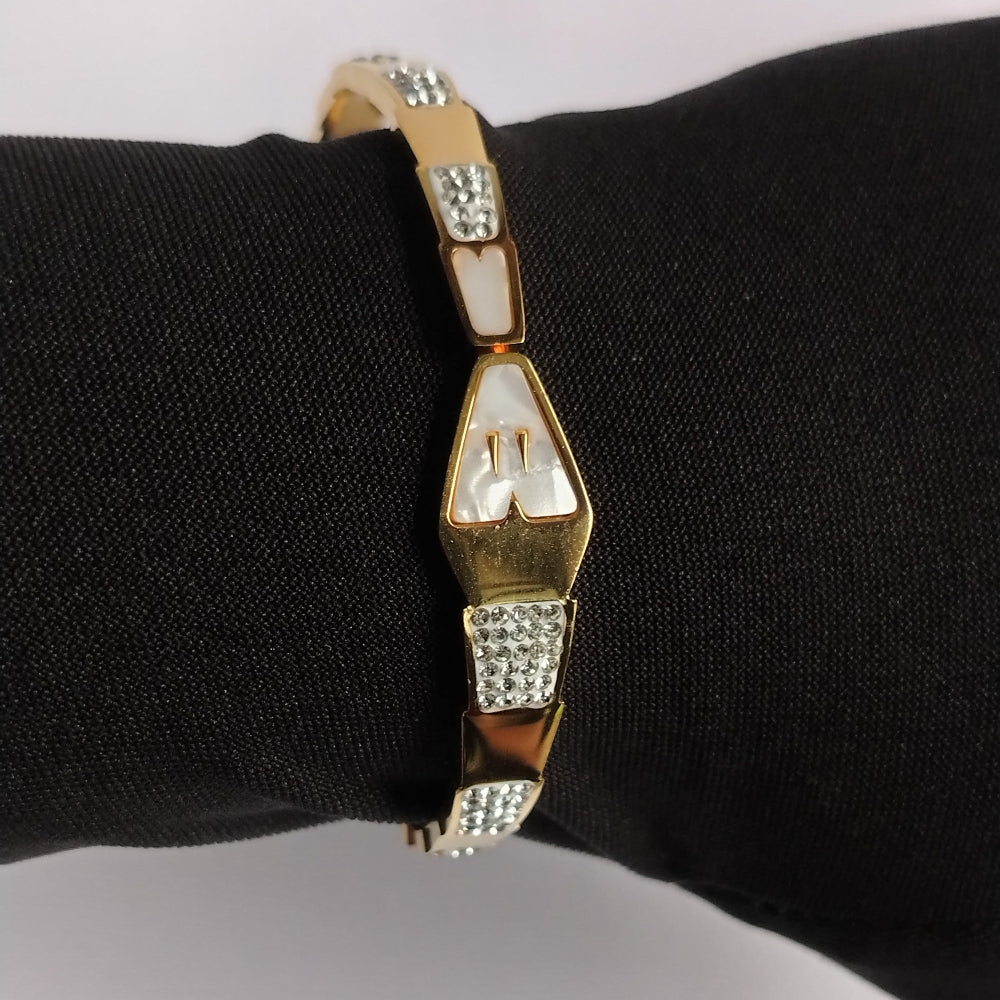 Diamond accent Golden Snakehood Bracelet on Black Gloved Hand