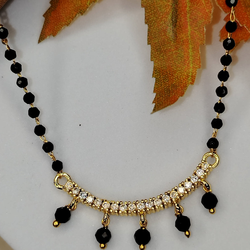 Mangalsutra with Ad and Balck Bead Charms