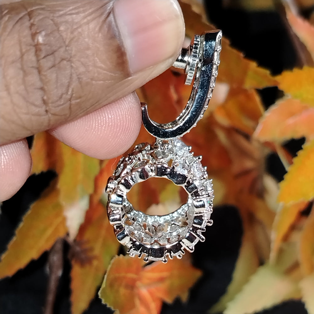 Side View of Earrings Showing the holllow of Drum Motif