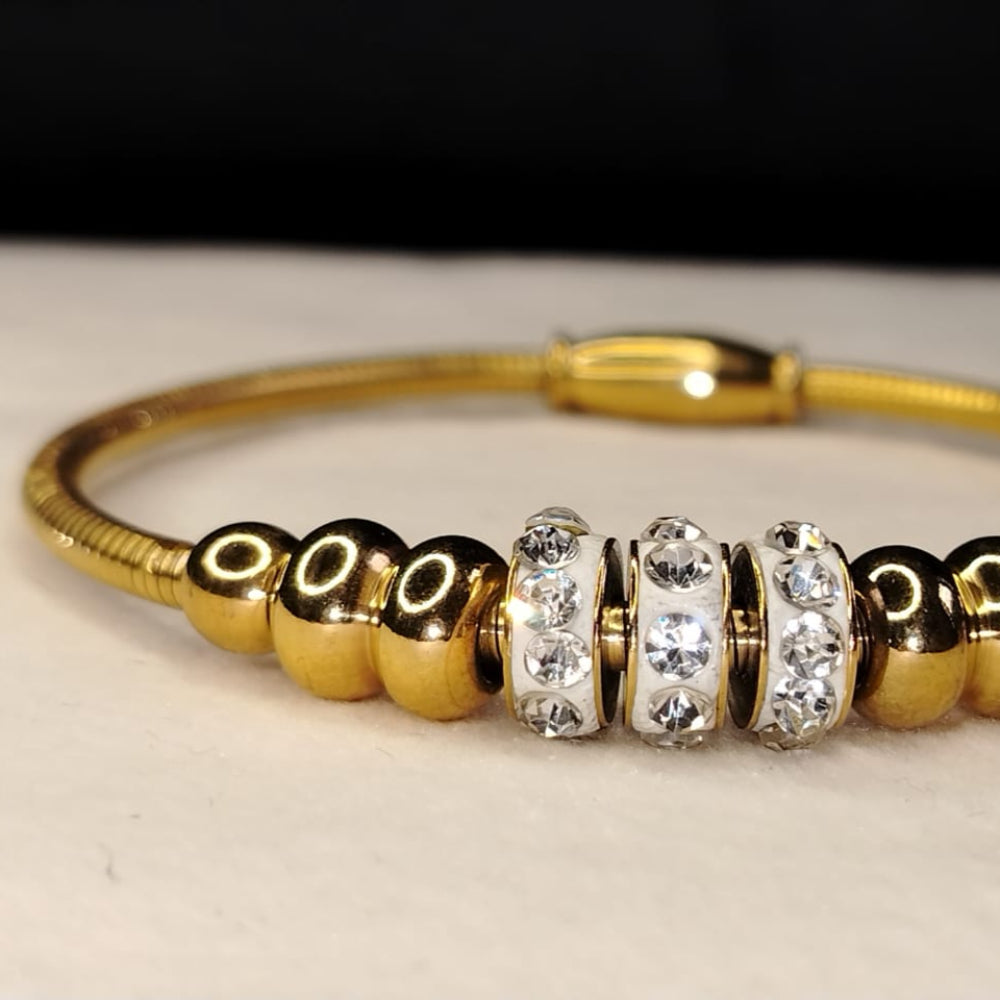 Golden Bracelet with Golden Beads and American Diamonds on Hoops