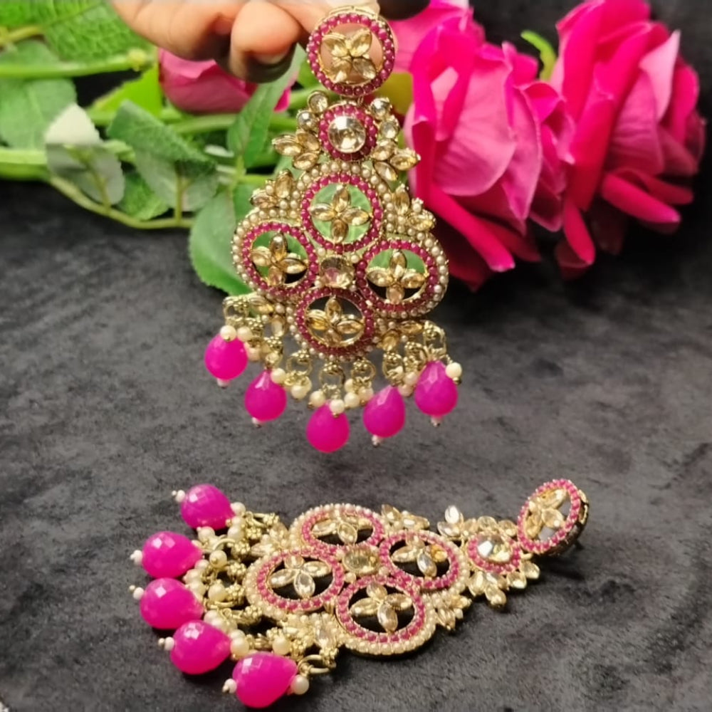 Orante Pink Floral Earrings iwth Kundan and Beads on Black Background