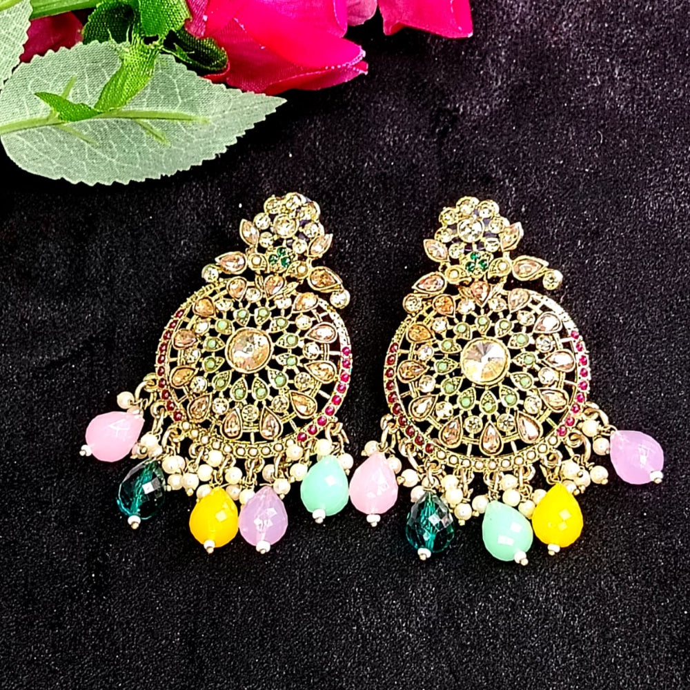 Colorful Beads Earrings with Kundan on a Black Surface and Roses