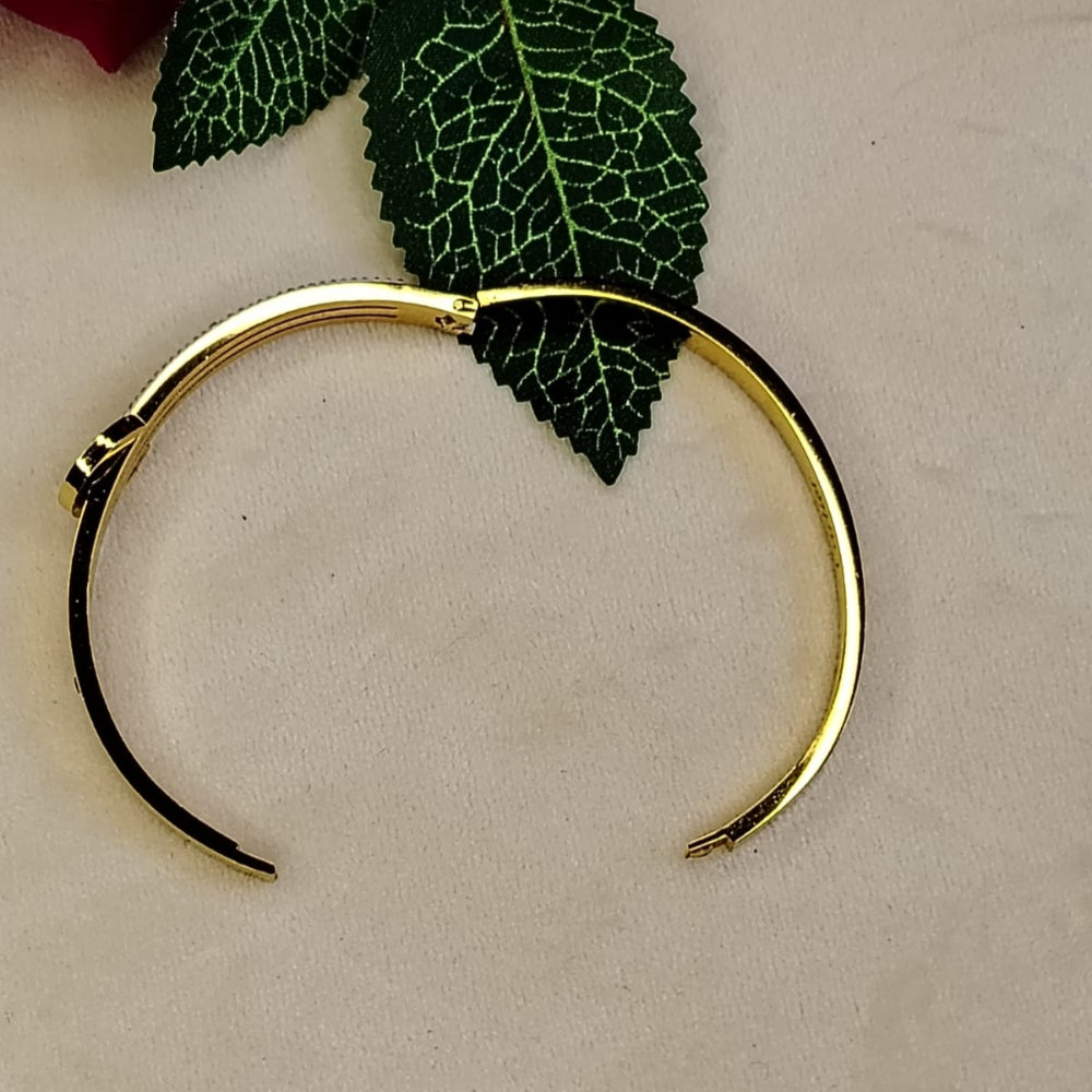 Golden Bracelet kept Open on a White Background