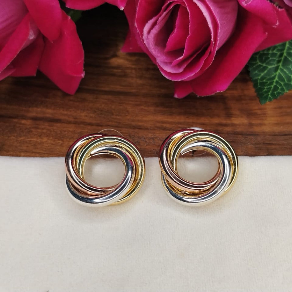 3-tone Circular Intertwined Earrings on a Wooden Background with Roses