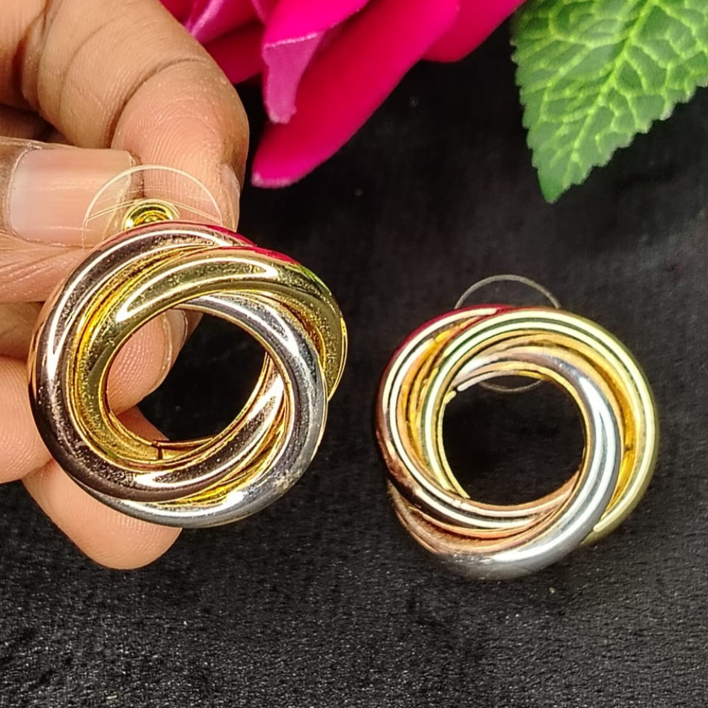 3-tone Circular Earrings Held by Model against Roses and Leaf