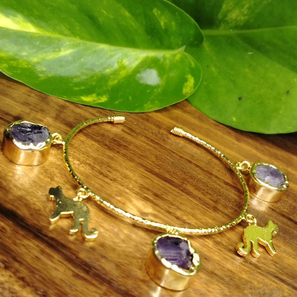 Golden Bracelet with Amethyst and Cheetah Charms