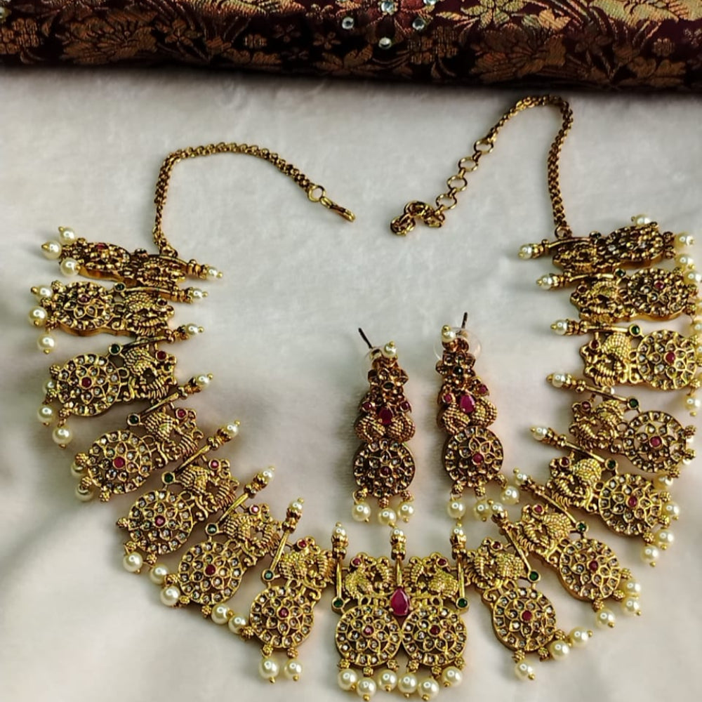 Antique Peacock and Chakra Jewelry Set of Necklace and Earrings on a White Background