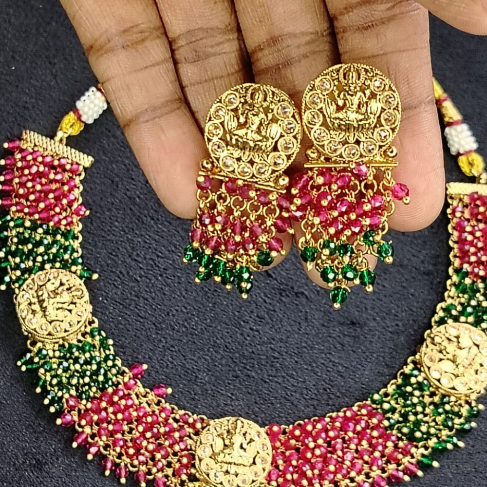 Ornate Idol Necklaceand Earrings with Hand-worked Hydro-beads Held by Hands