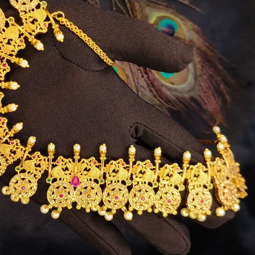 Antique Golden Choker Held by Gloved Hands against Black Background with Pacock Feather