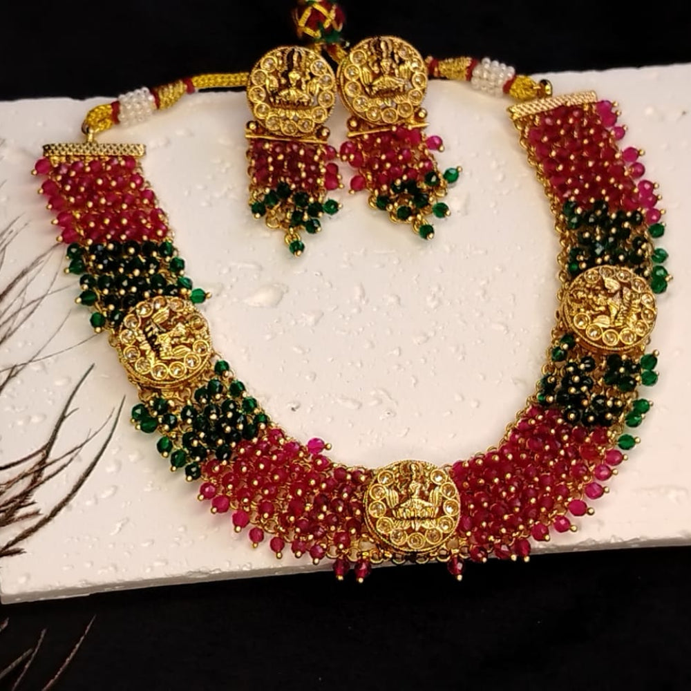 Idol Necklace and Earrings with Pink and Green Hand-worked Hydro-beads on White Textured Background
