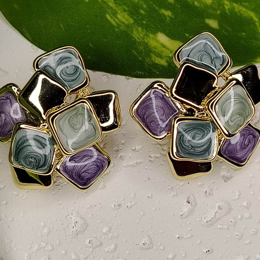 Geometric Design Earrings with Multicolored Enamel on Textured hite Background