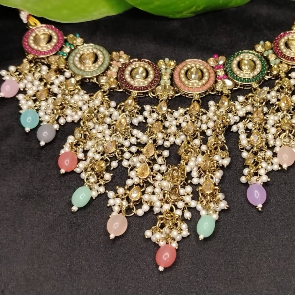 Intricate Waterfall Style Multicolr Necklace with Kundan on Black Surface