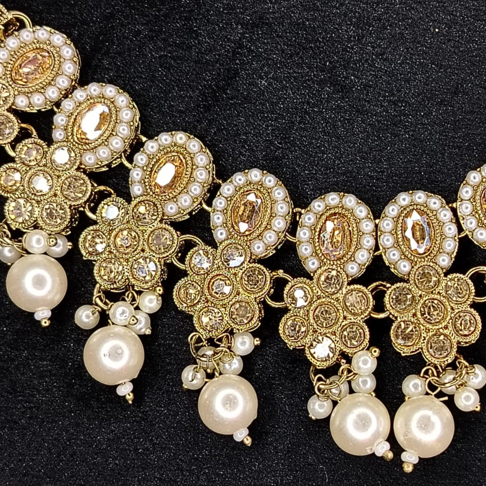 Floral Kundan Details with Pearl of a Necklace