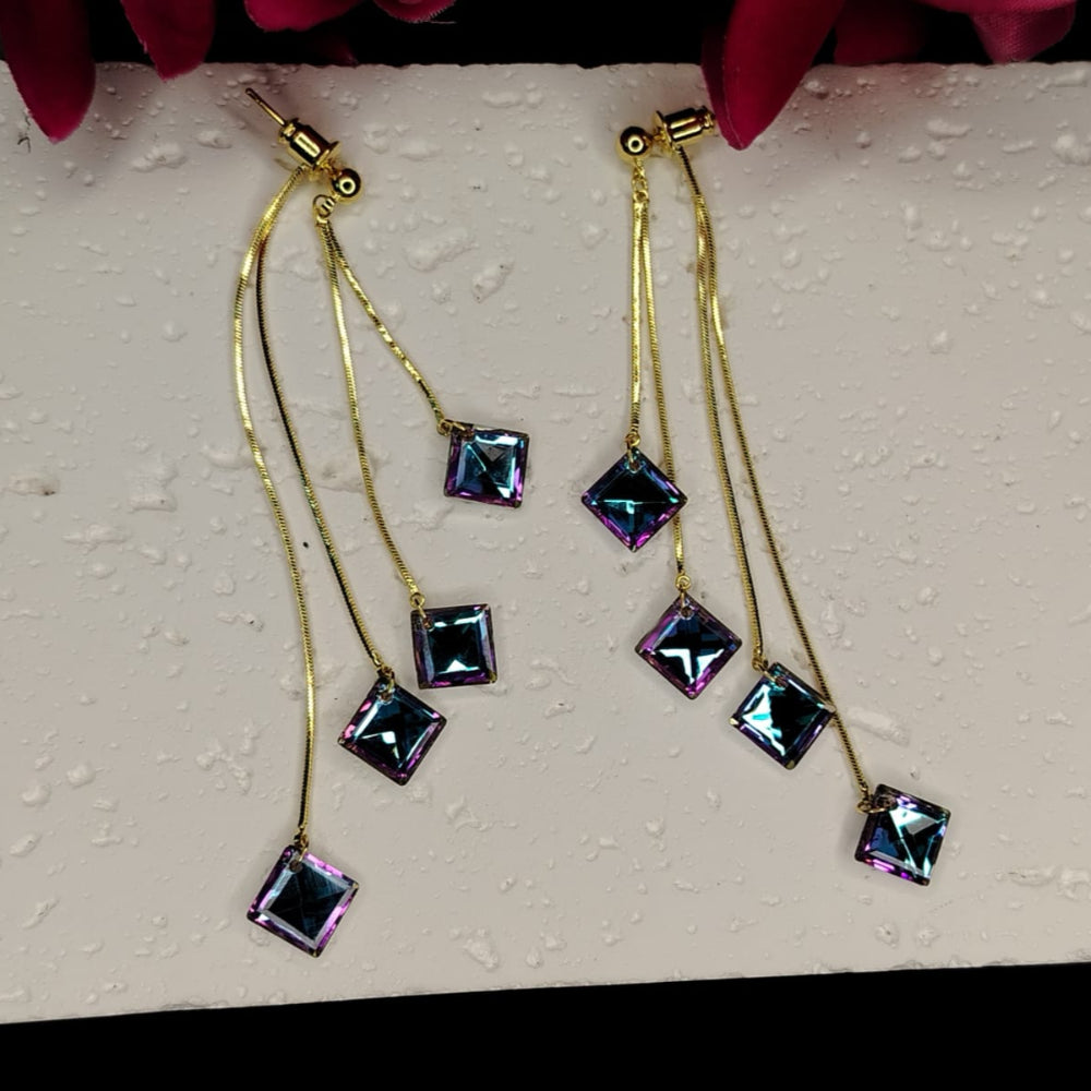 Gold earrings with square rainbow Crystals on a textured white surface