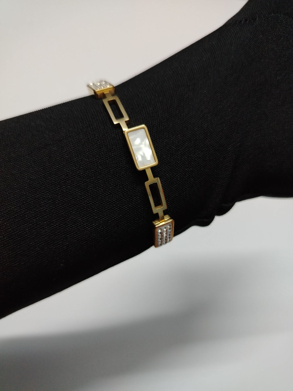 MOP and AD Bracelet on Hand with Black Gloves