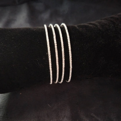 Set of 4 Rhodium Polish AD Bangles on Velvet Fabric