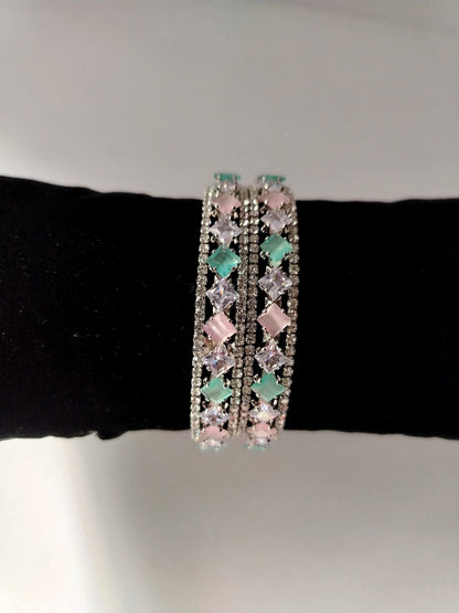 Pink Mint Moissonite and AD bangles on Black Cushion
