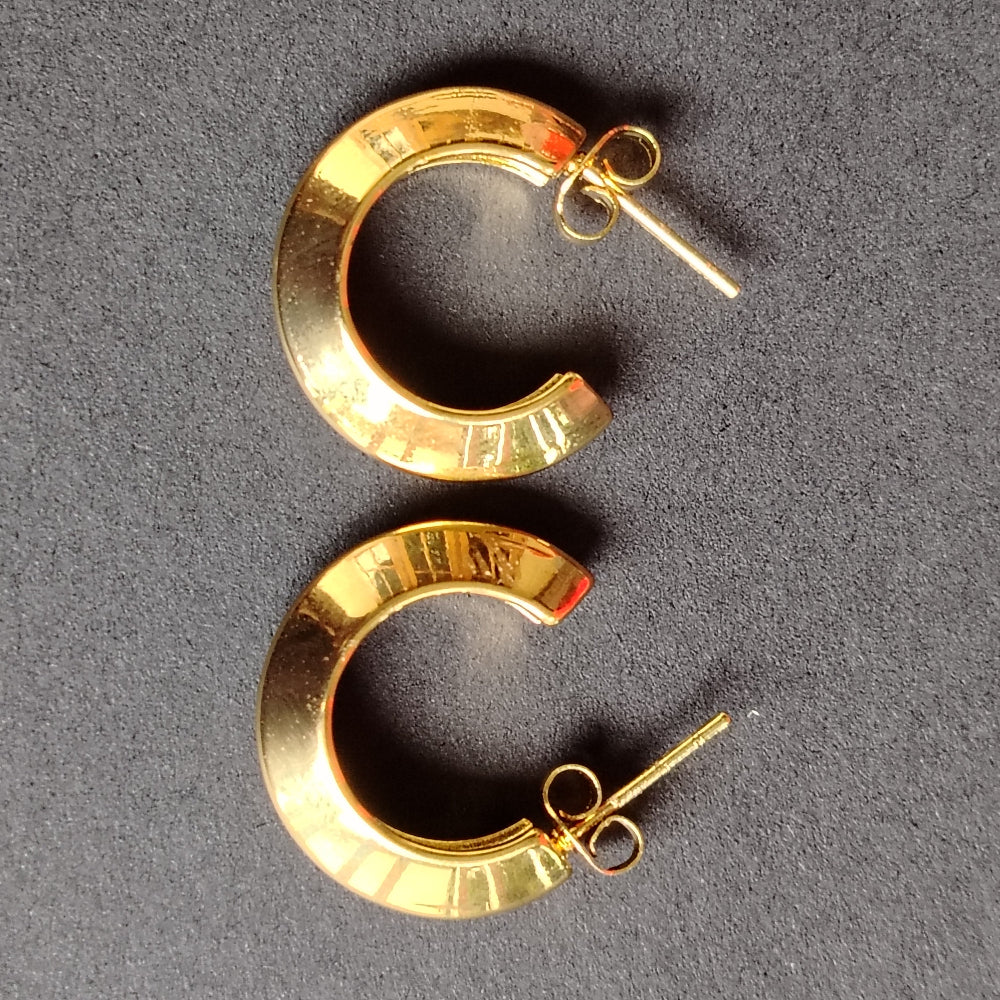 Pair of Anti-tarnish Golden Hoops Earrings on a Gray Background