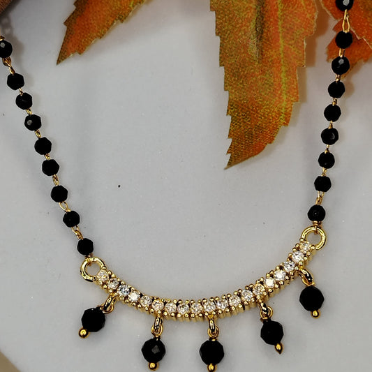 Mangalsutra with Ad and Balck Bead Charms