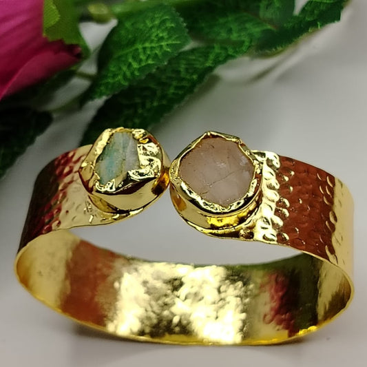Gold Polished Handcuff with Semi-precious Stone on a White background