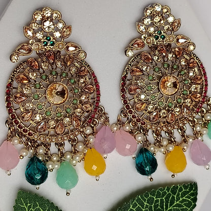 Ornate Earrings with Colorful Beads and Kundan on a White surface