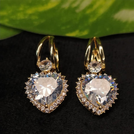 Ant-tarnish Hoops with Large Heart Shaped American Diamond on Dark Background with Leaves