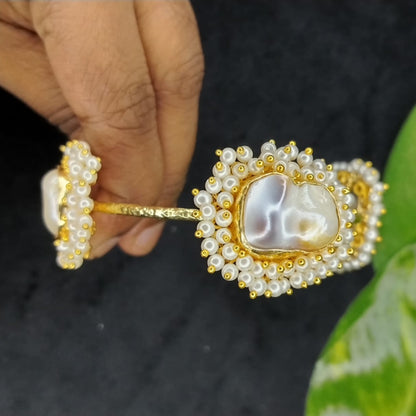 Golden Natural Pearl Bracelet Held in Hands