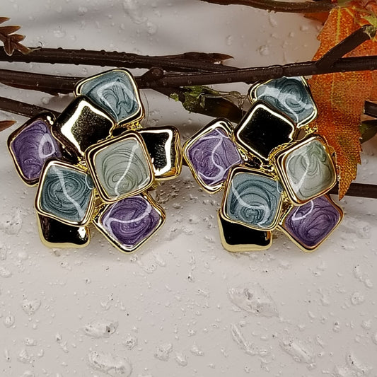 Colored Enamel Square design Earrings on White Background with Braches and Leaves