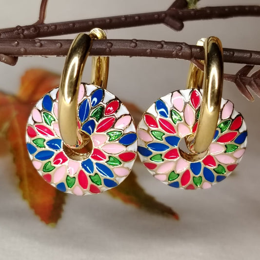 Colorful Enamel earrings with golden Hoops on a Branch