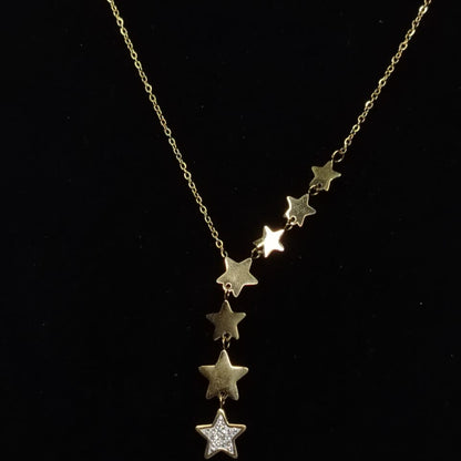 Golden anti-tarnish necklace with star-shaped pendants on a black background