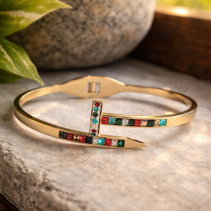 Multicolored CZ Stone Nail Bracelet on Stone Surface